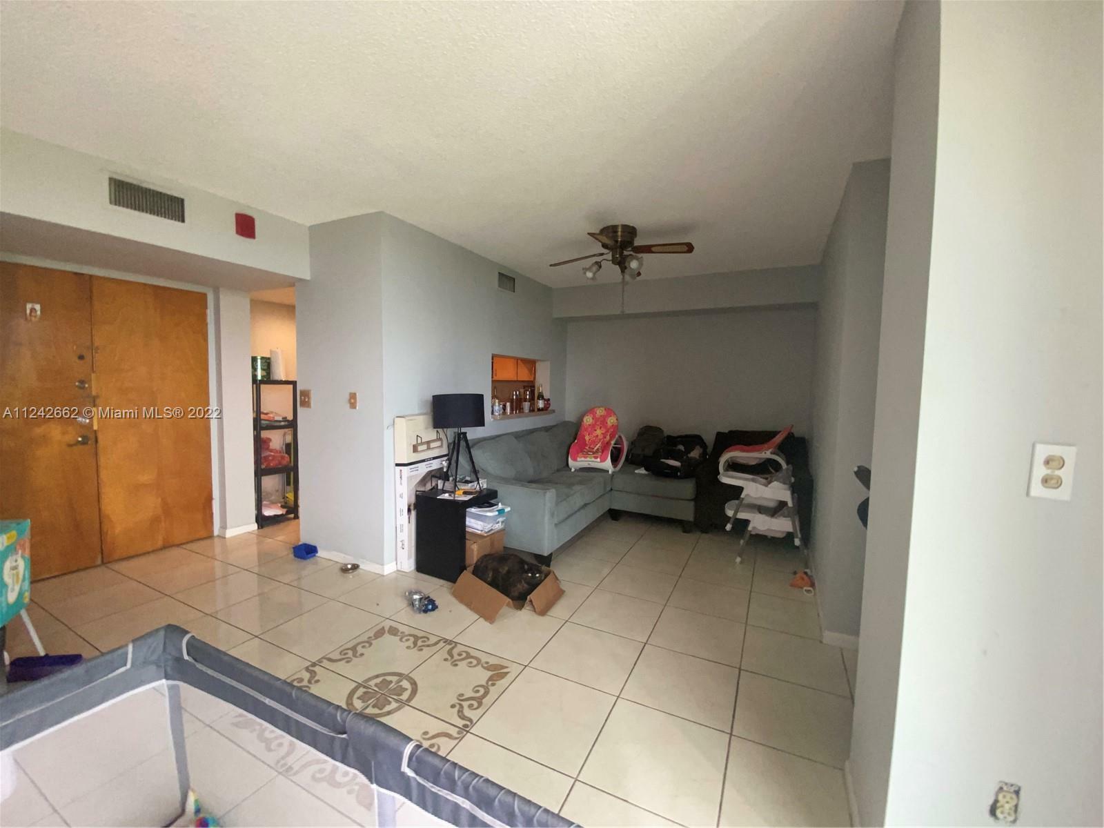 Property Photo:  11750 SW 18th St 505-1  FL 33175 