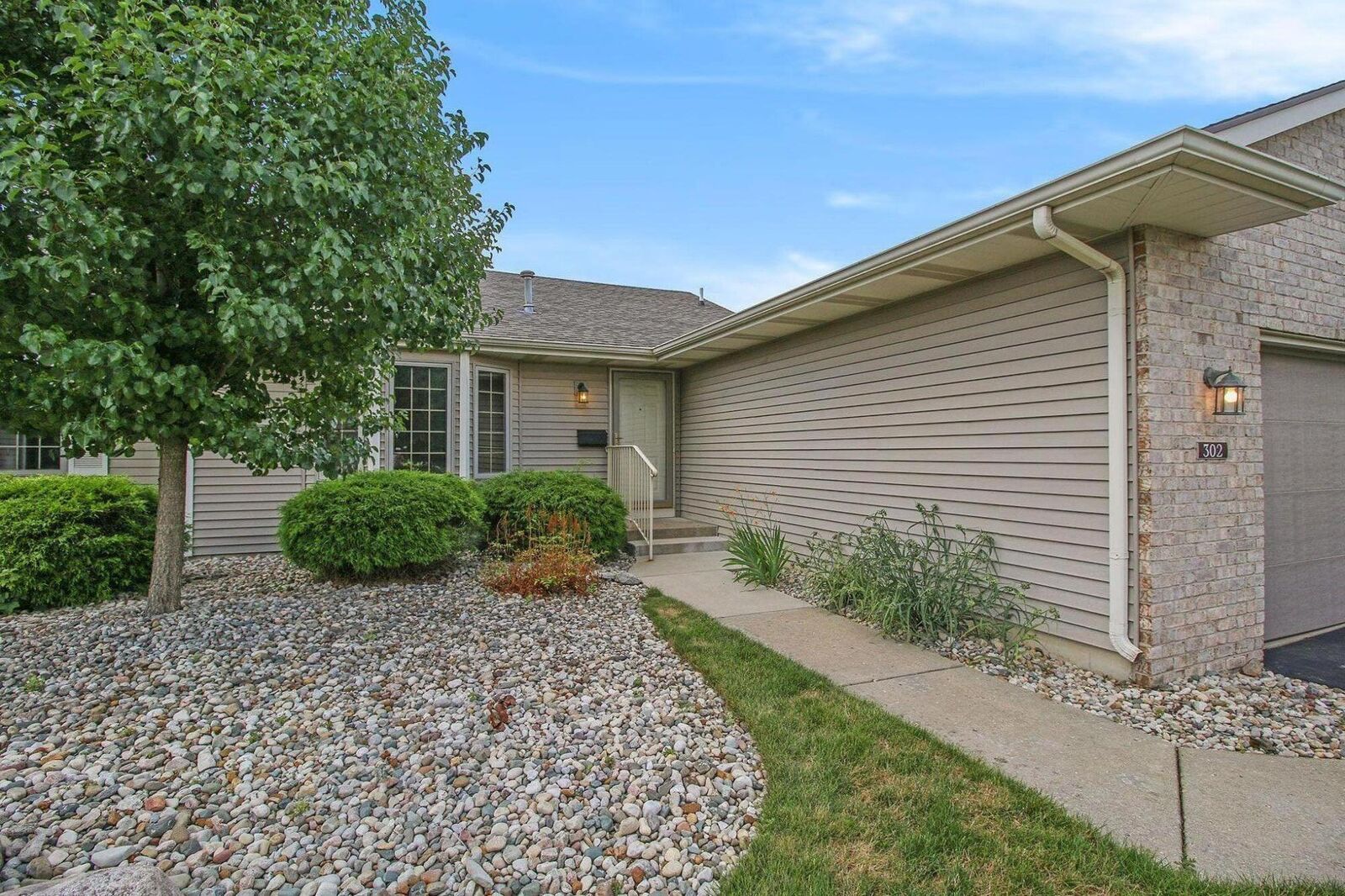 Property Photo:  302 Hickory Drive  MI 49348 