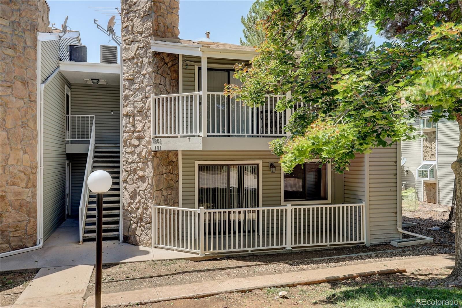 Property Photo: 908 S Walden Way 101 CO 80017
