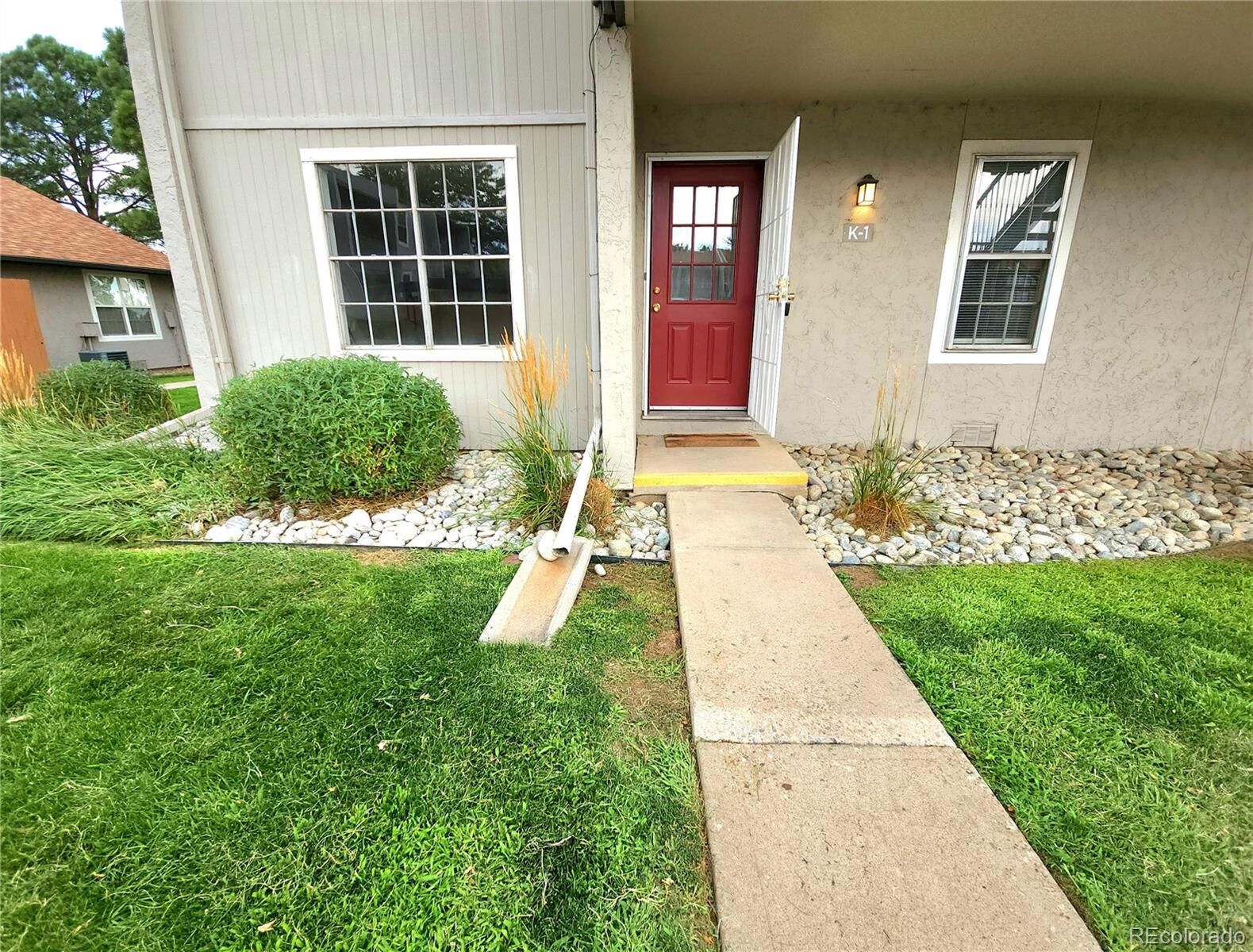 Property Photo:  7110 S Gaylord Street K-01  CO 80122 