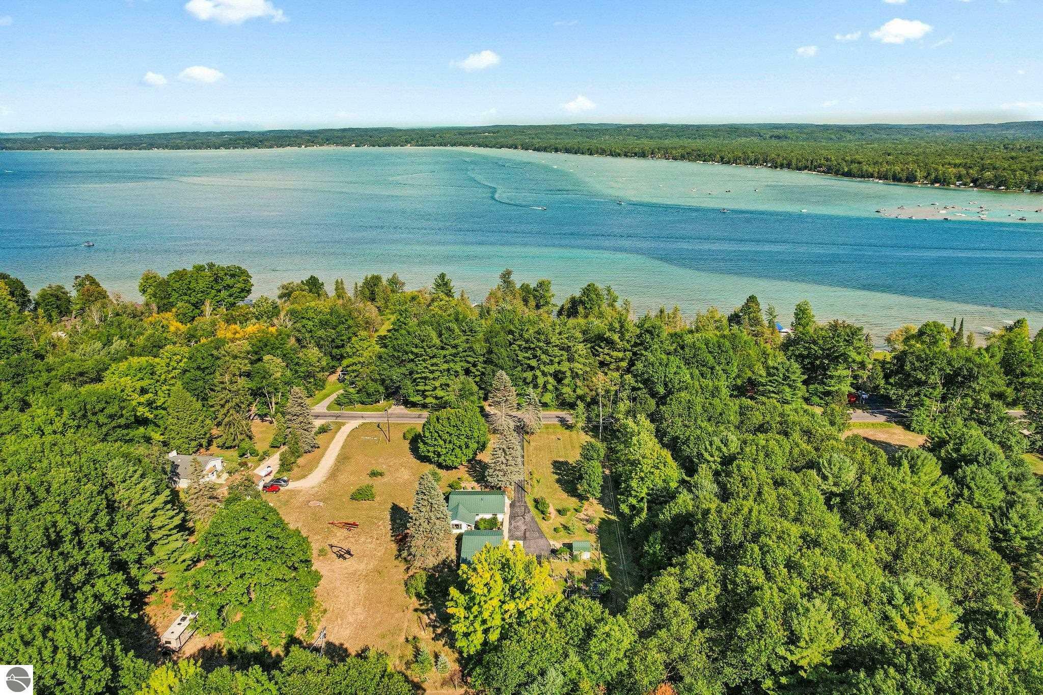 Property Photo:  12060 SW Torch Lake Drive  MI 49676 