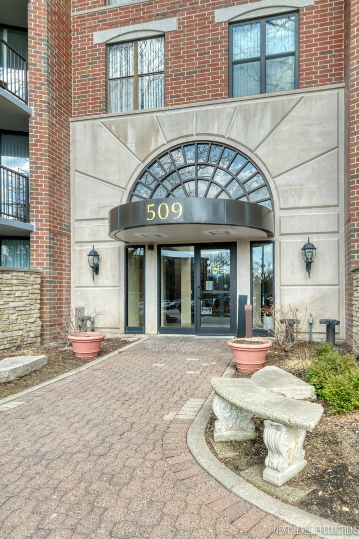 Property Photo:  509 Aurora Avenue 306-7  IL 60540 