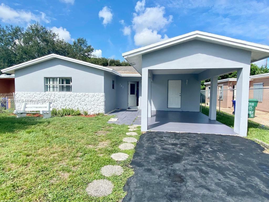 Property Photo:  107 NW 28th Ave  FL 33311 