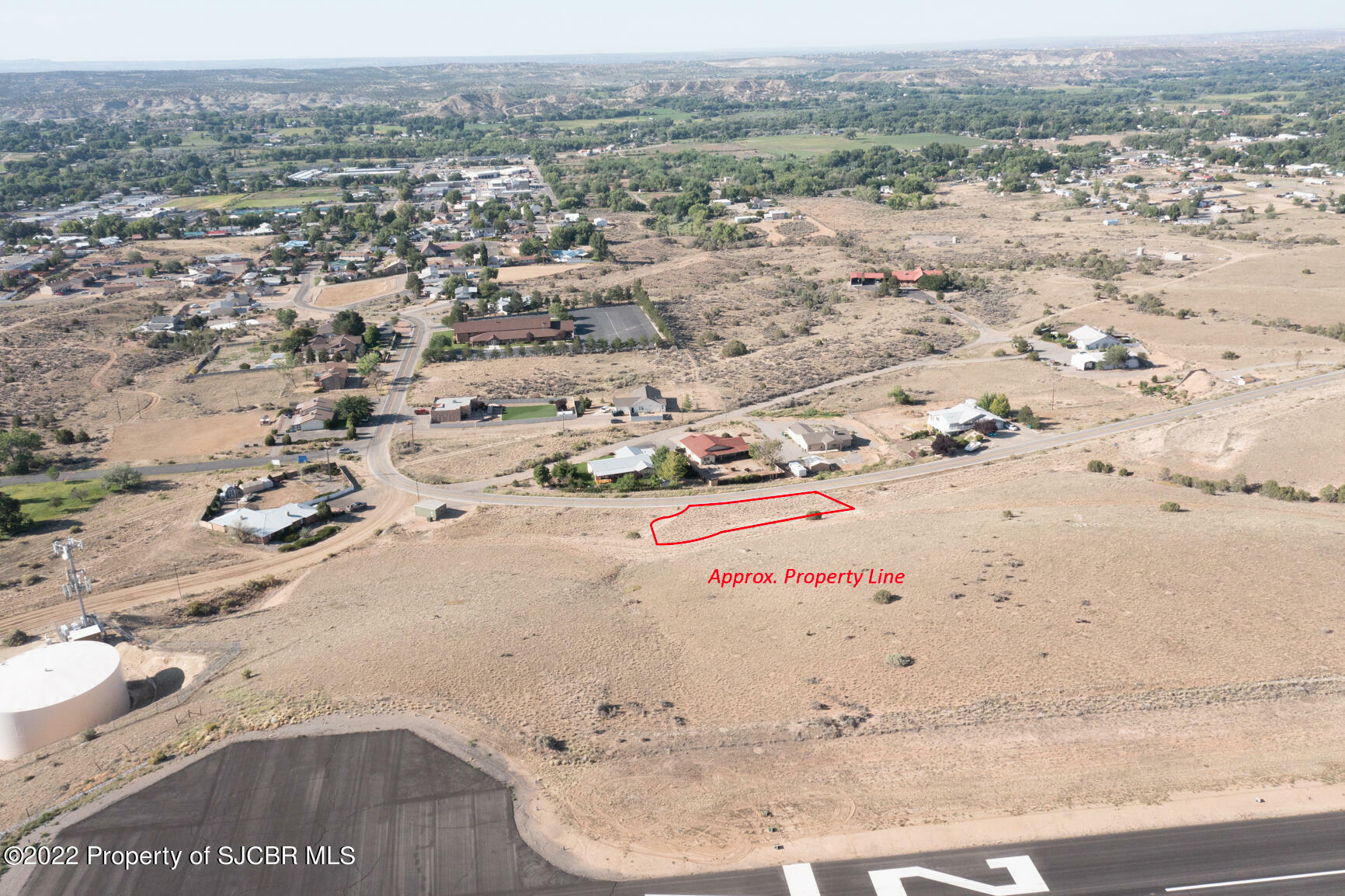 Property Photo:  705 Airport Drive  NM 87410 