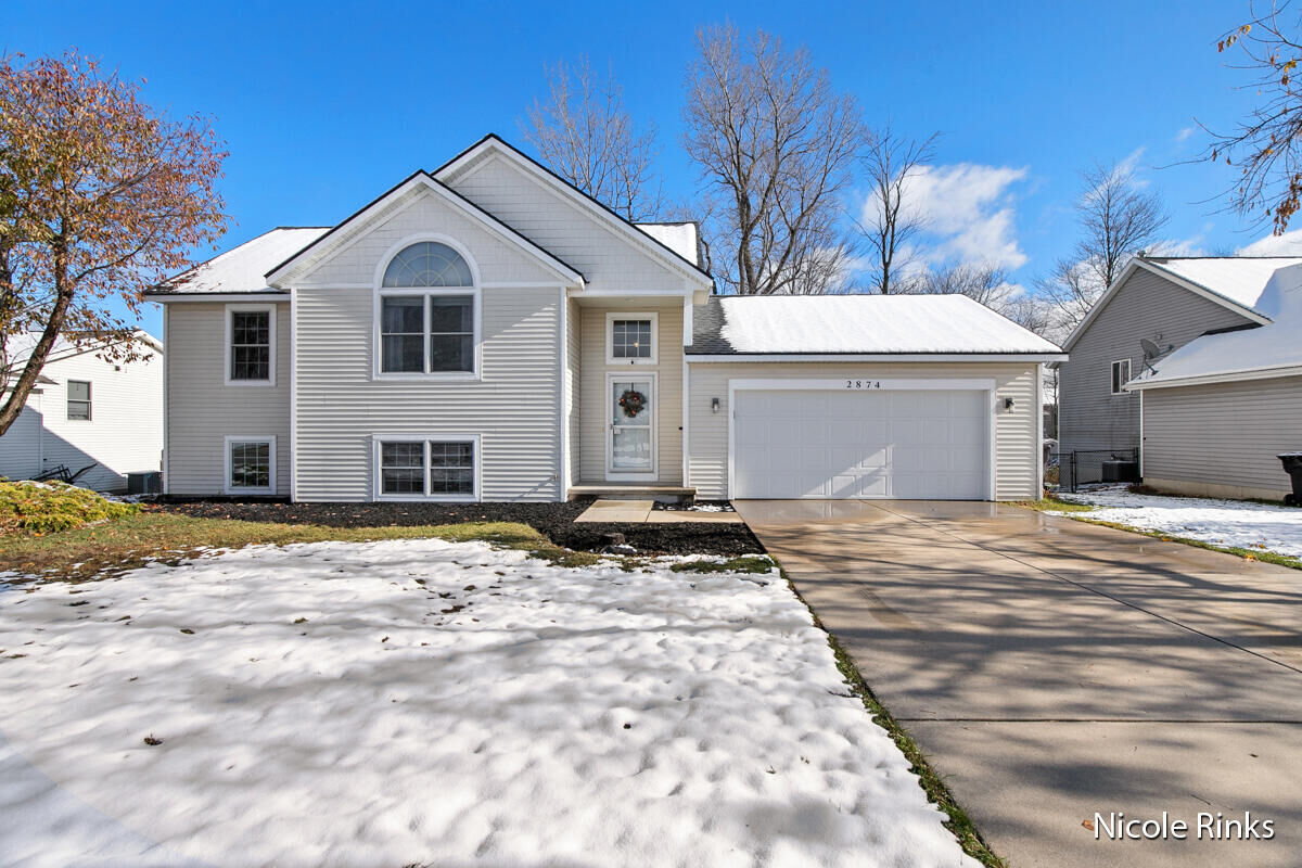 Property Photo:  2874 Sunrise Avenue  MI 49424 