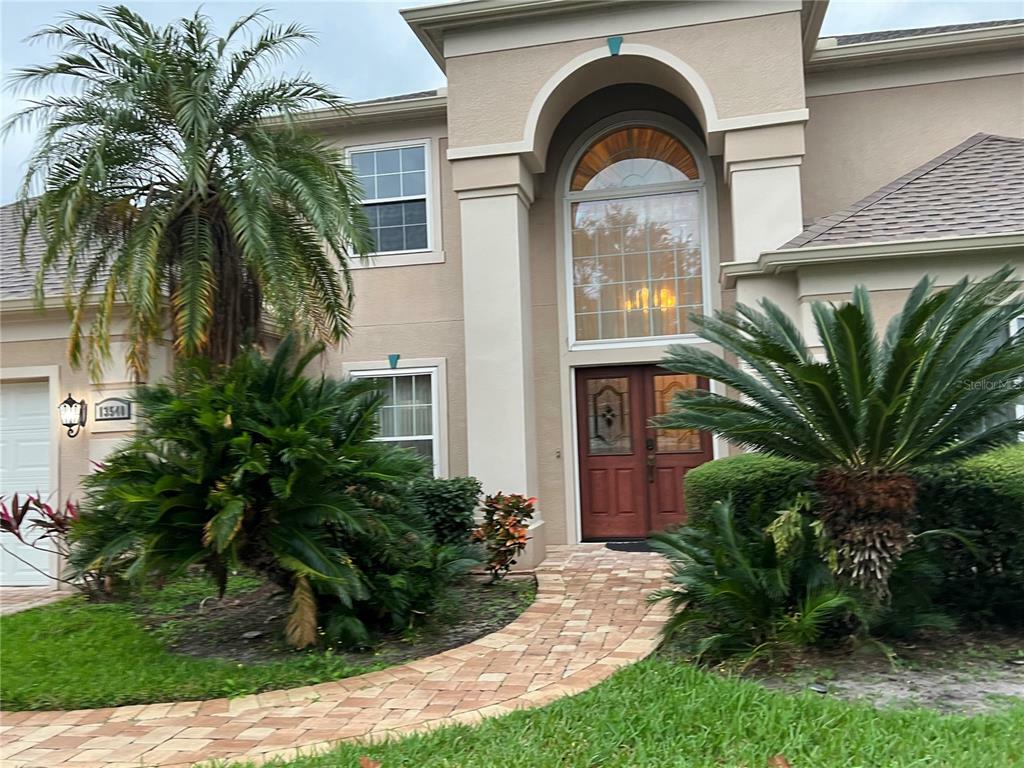 Property Photo: 13540 Falcon Pointe Drive FL 32837
