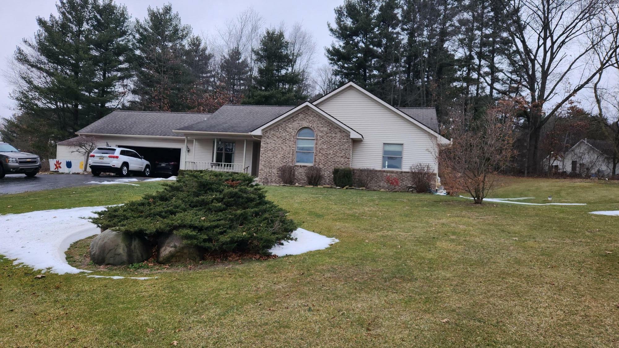 Property Photo:  2018 Blackmer Drive  MI 49250 