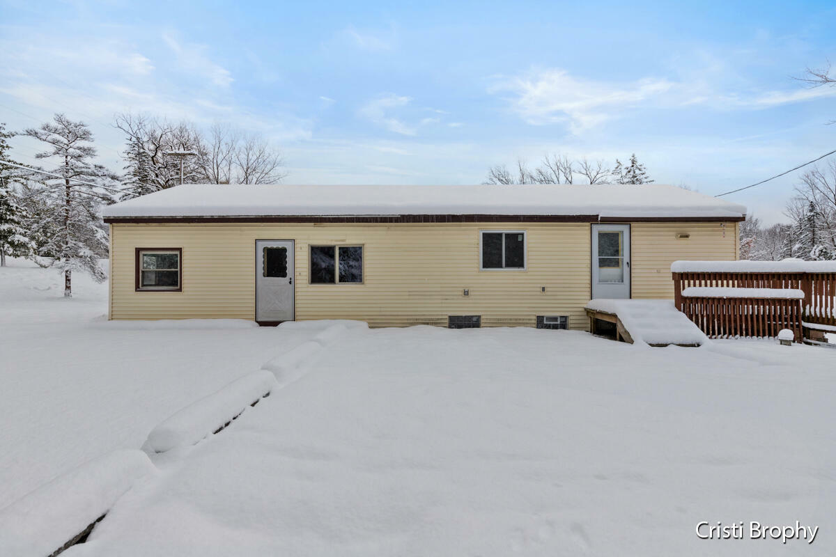 Property Photo:  8338 Fulton Street E  MI 49301 