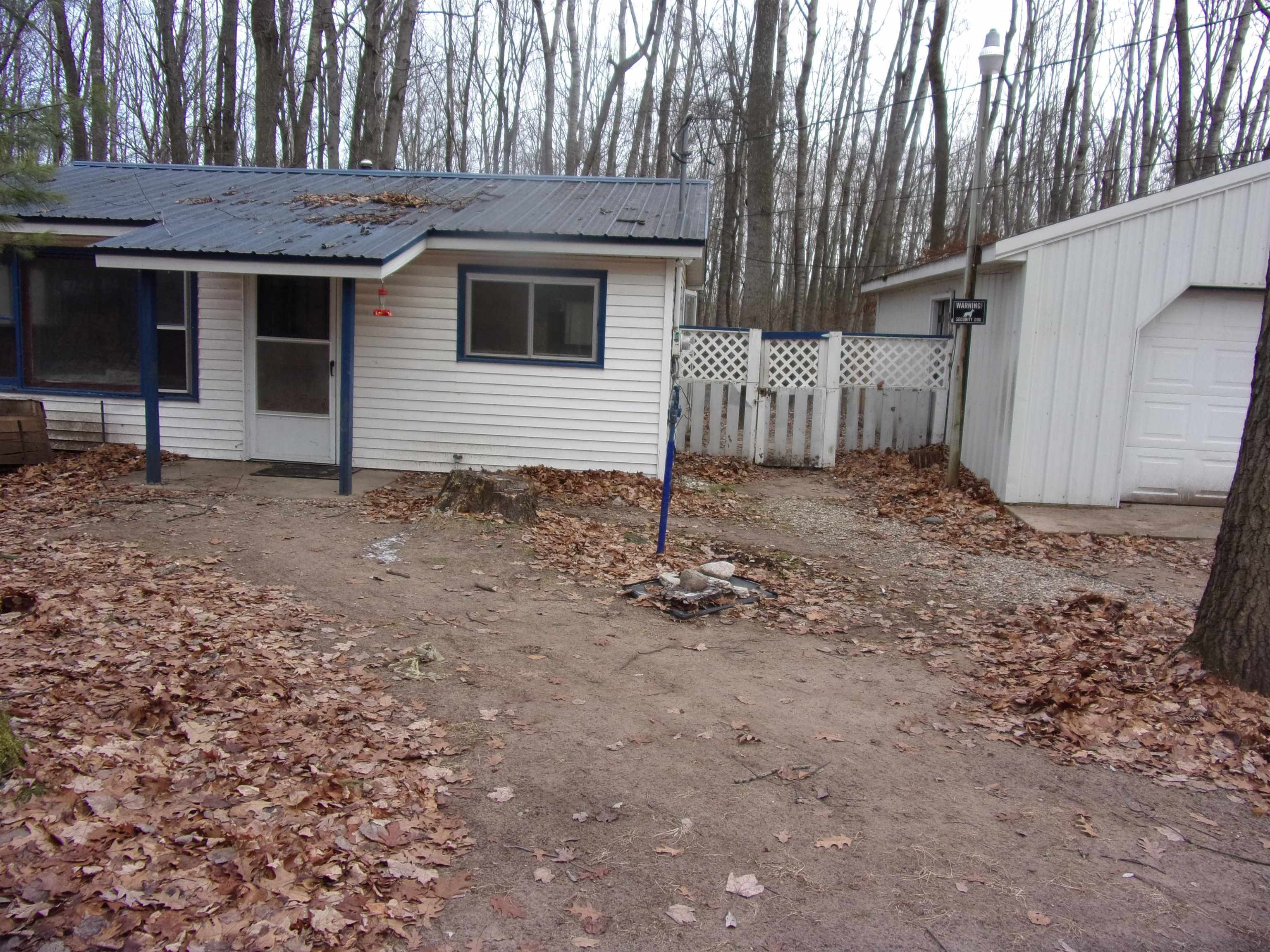 Property Photo:  766 N Dodge Lake Road  MI 48625 