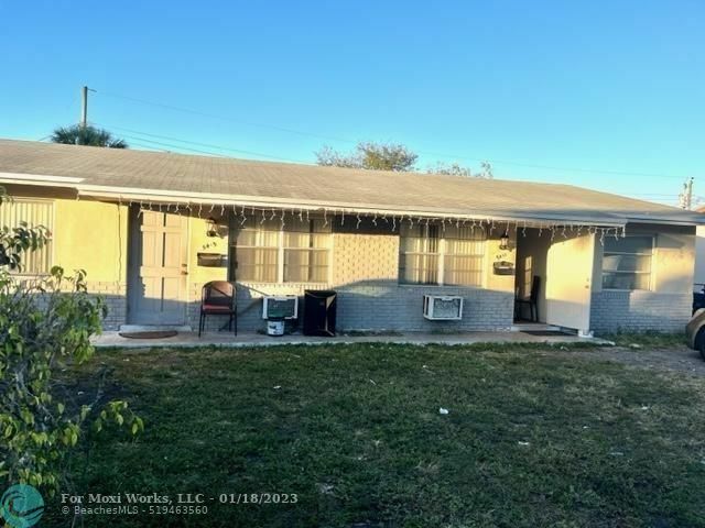 Property Photo: 5411-5415 NW 15th Ct FL 33313