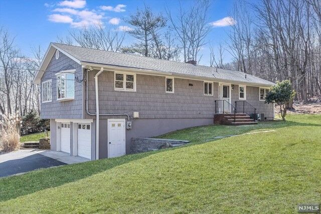 Property Photo:  115 Roosevelt Avenue  NJ 07508 