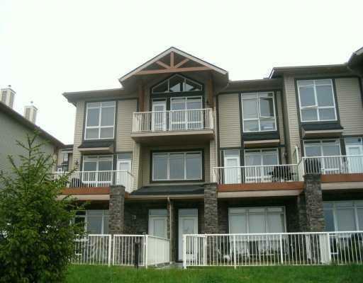 Property Photo: 1, 117 Rockyledge View NW 1 AB T3G 5X1