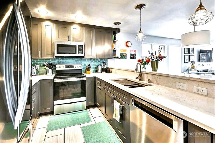 Property Photo: 4457 44th Avenue SW 104 WA 98116