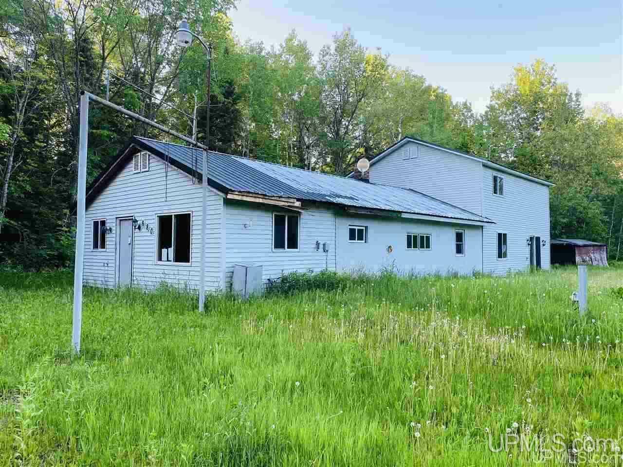 Property Photo:  680 Johnson Rd  MI 49968 