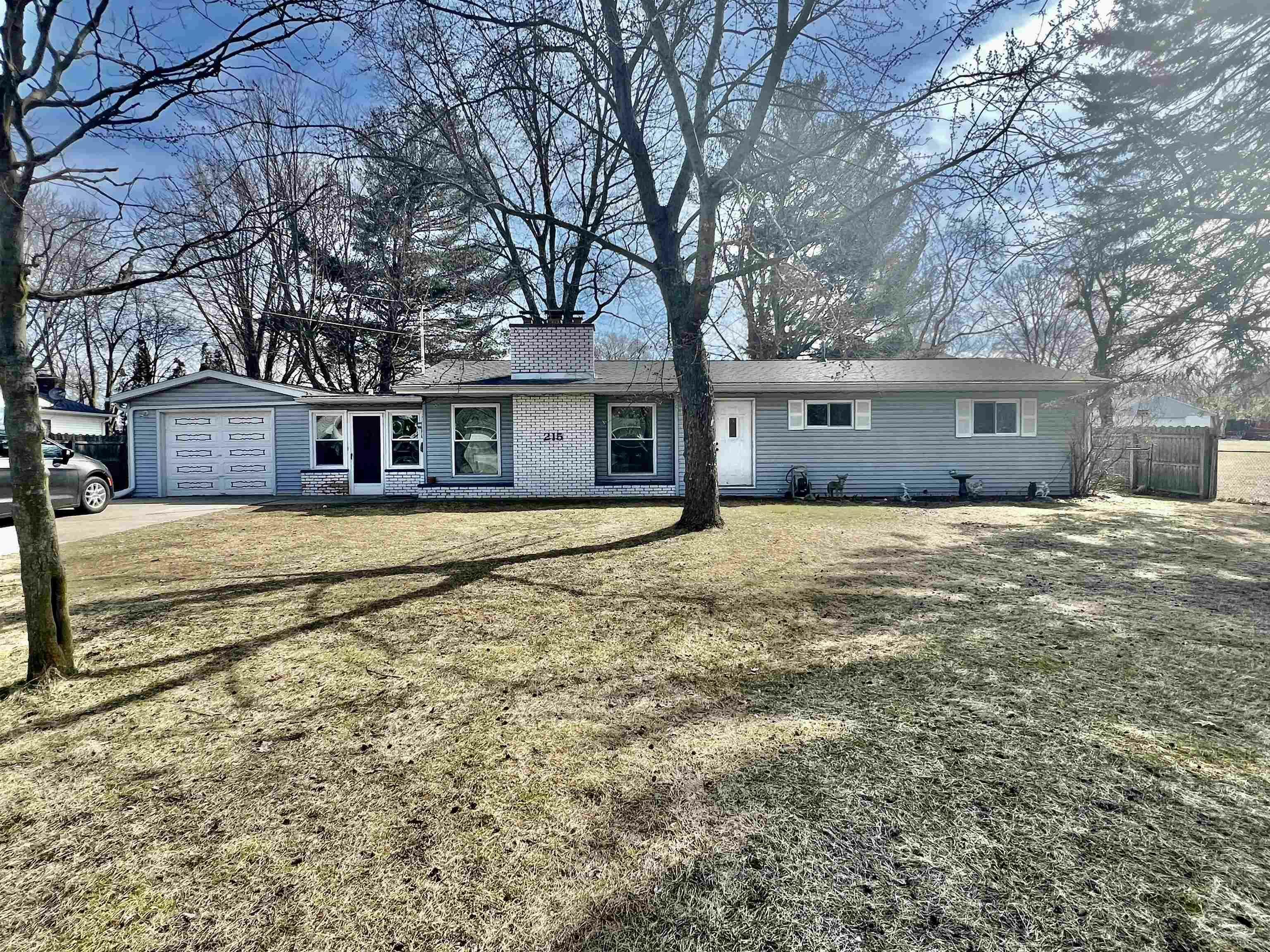 Property Photo:  215 W Harcourt  MI 48609 