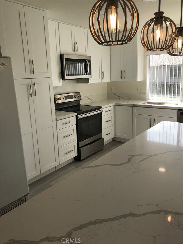 Property Photo: 16952 Limelight Circle A CA 92647