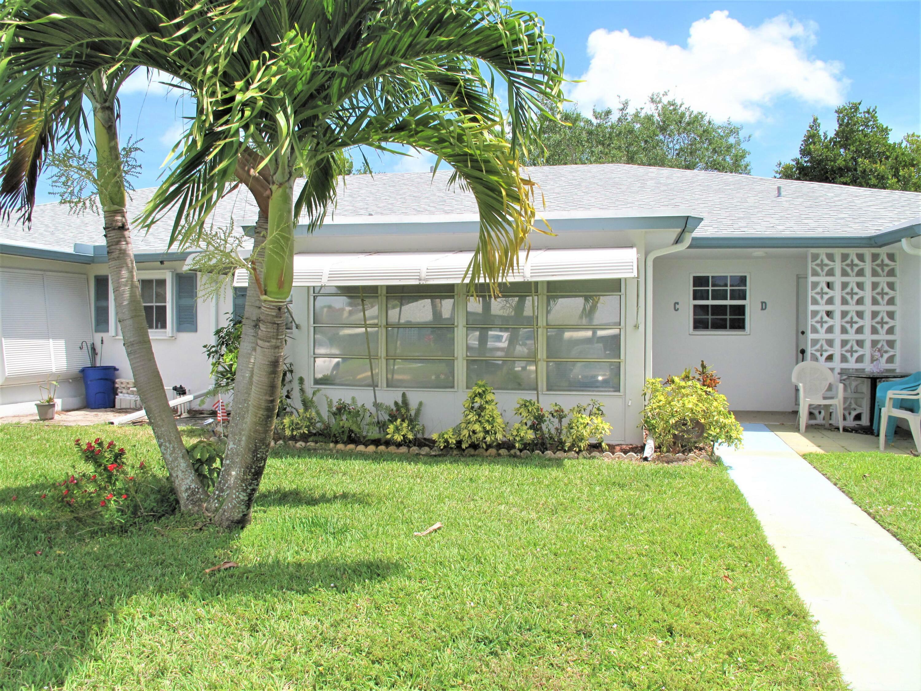 Property Photo:  1062 North Drive C  FL 33445 