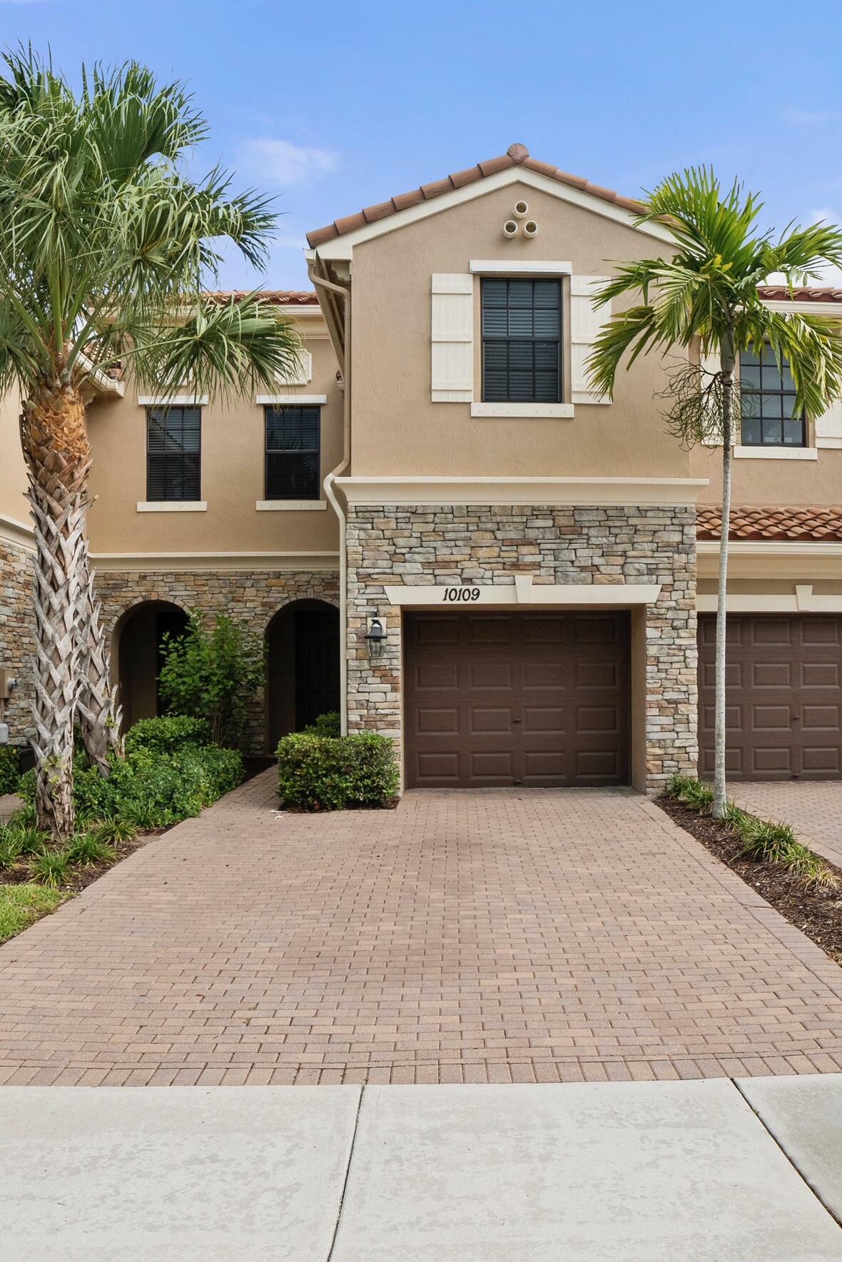 Property Photo: 10109 Wellington Parc Drive FL 33449