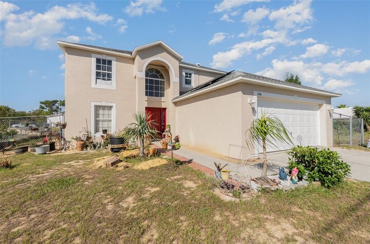Property Photo:  406 Naples Court  FL 34759 