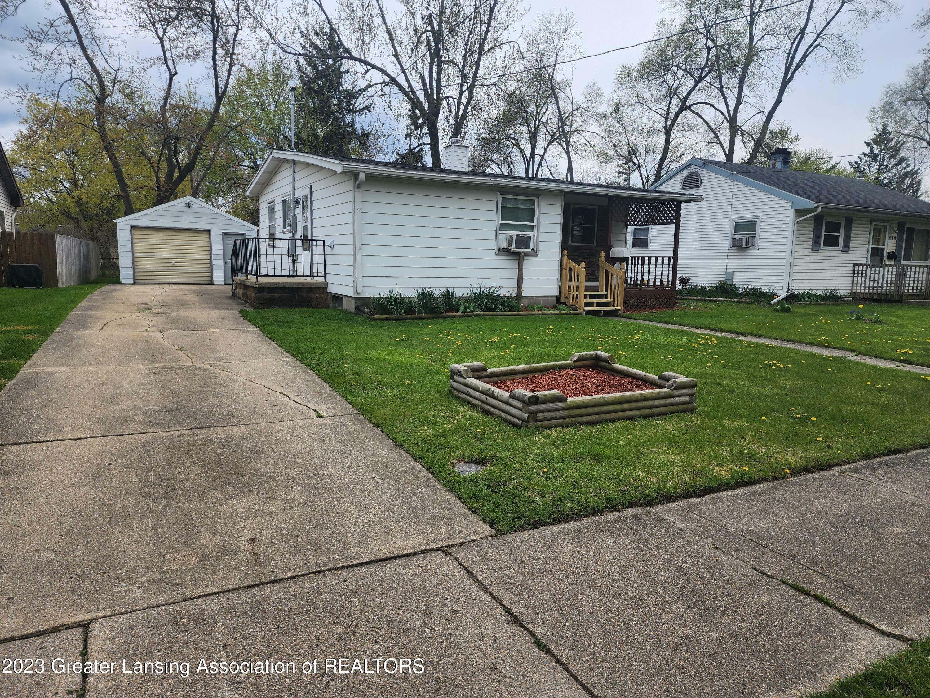 Property Photo:  120 Cox Boulevard  MI 48910 