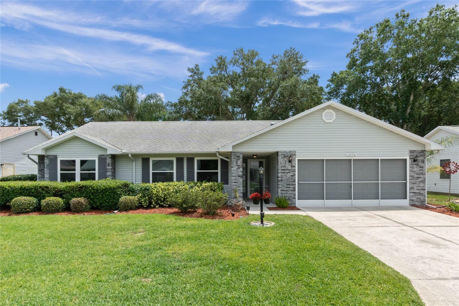 Property Photo:  25916 Newcombe Circle  FL 34748 