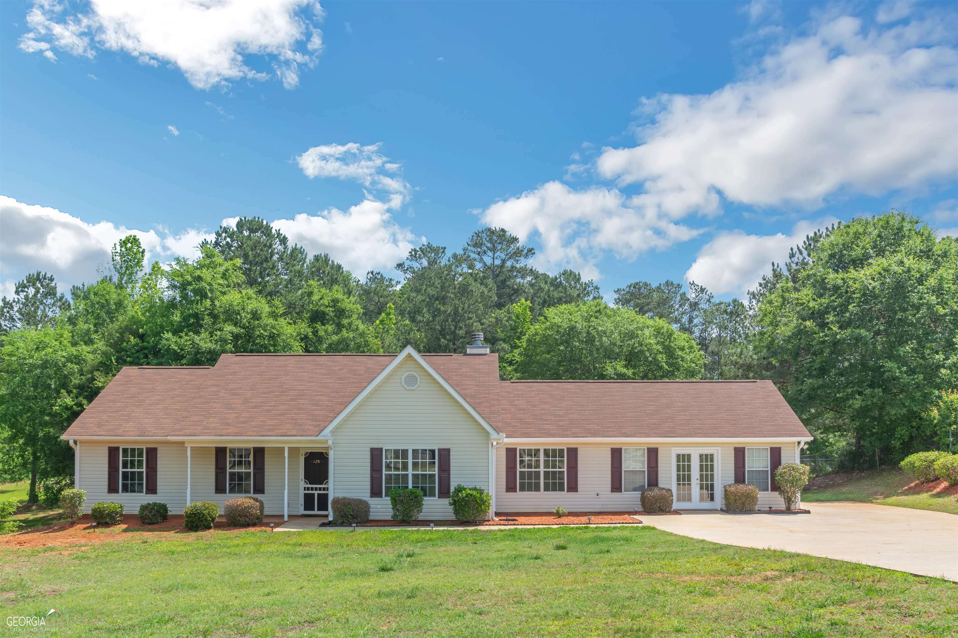 Property Photo:  128 Cottonwood Trail Trail  GA 30233 