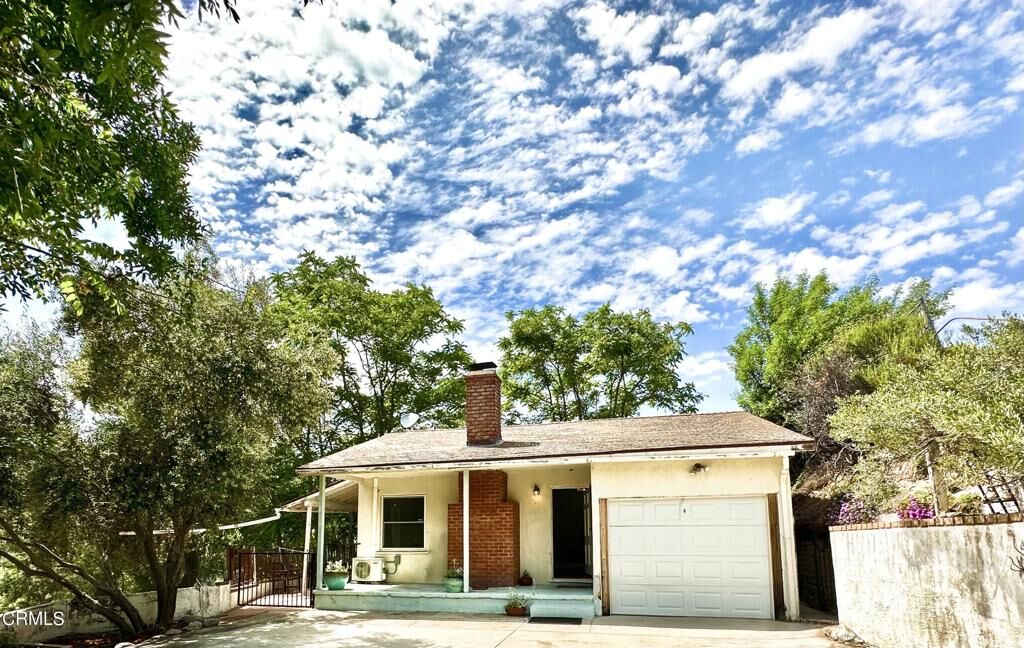 Property Photo:  9817 Commerce Avenue  CA 91042 