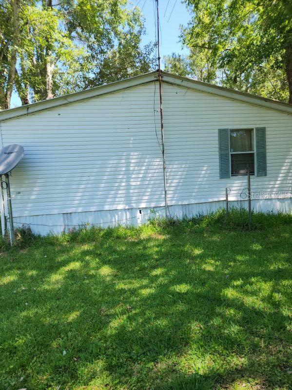 Property Photo:  13481 NE 66th Avenue  FL 32113 