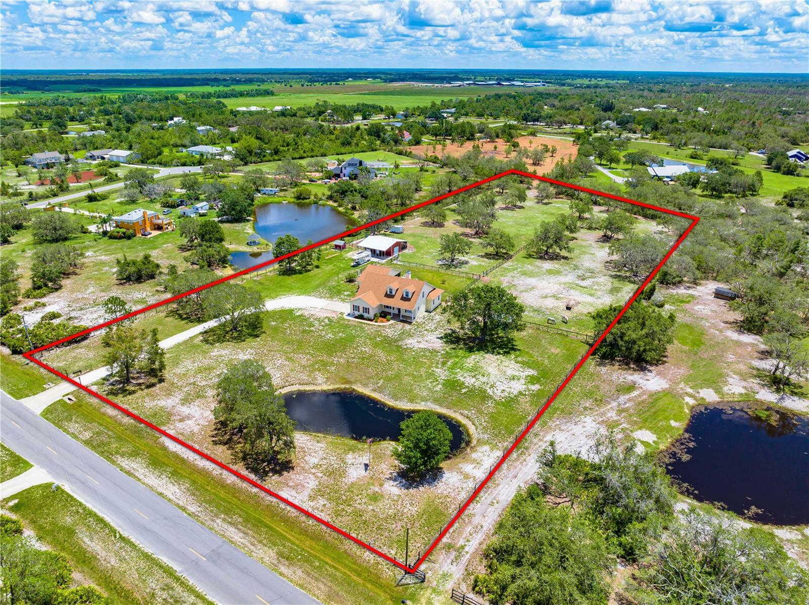 Property Photo: 10005 284th Street E FL 34251