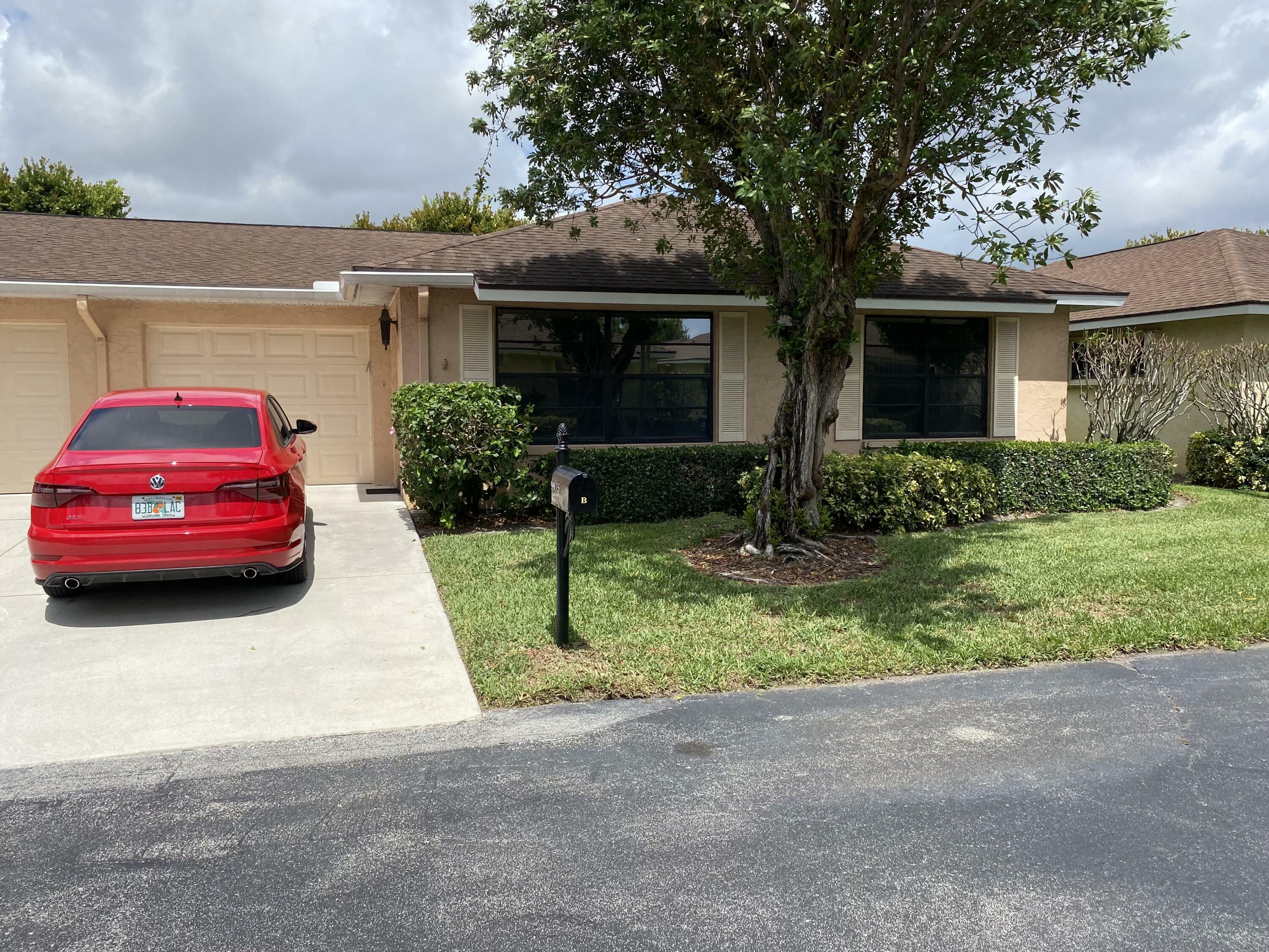 Property Photo:  9975 Orchid Tree Trail E B  FL 33436 