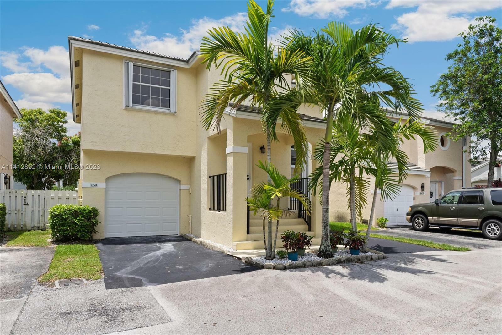 Property Photo:  859 NW 99th Ave .  FL 33324 