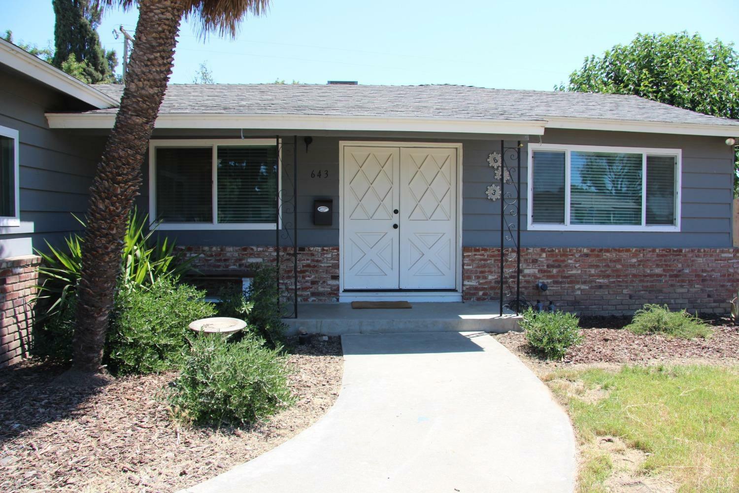 Property Photo:  643 E Deodar Lane  CA 93245 