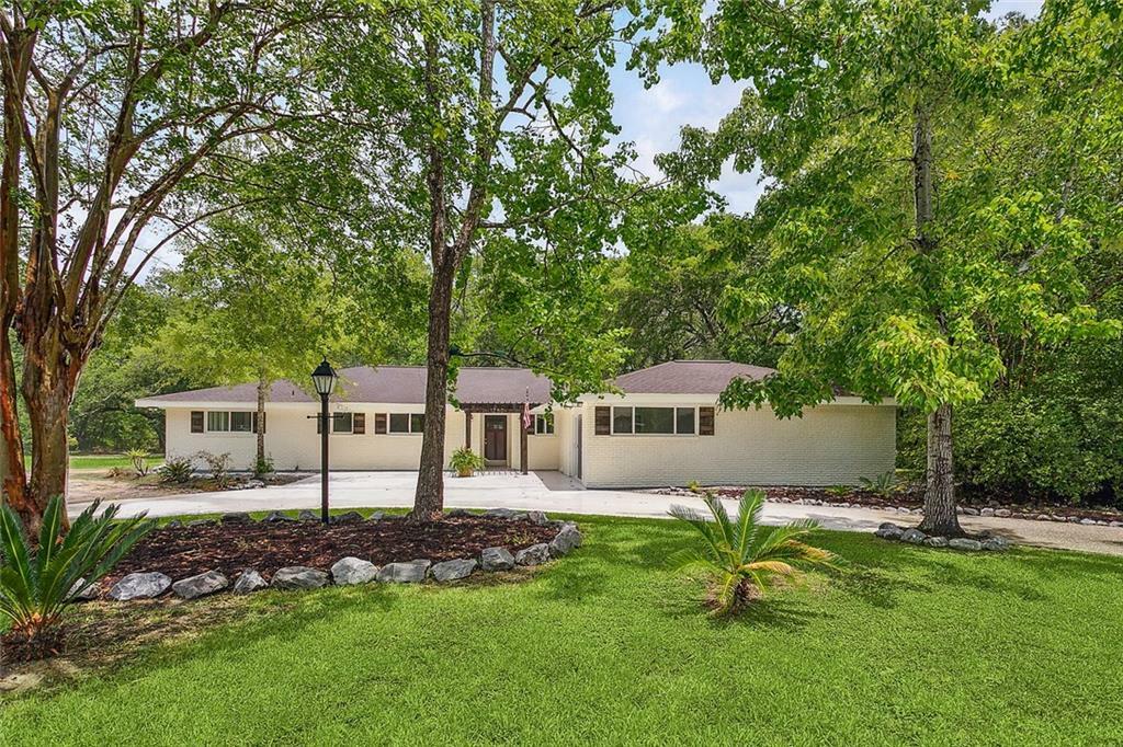 Property Photo:  1280 St. Scholastica Drive  LA 70460 