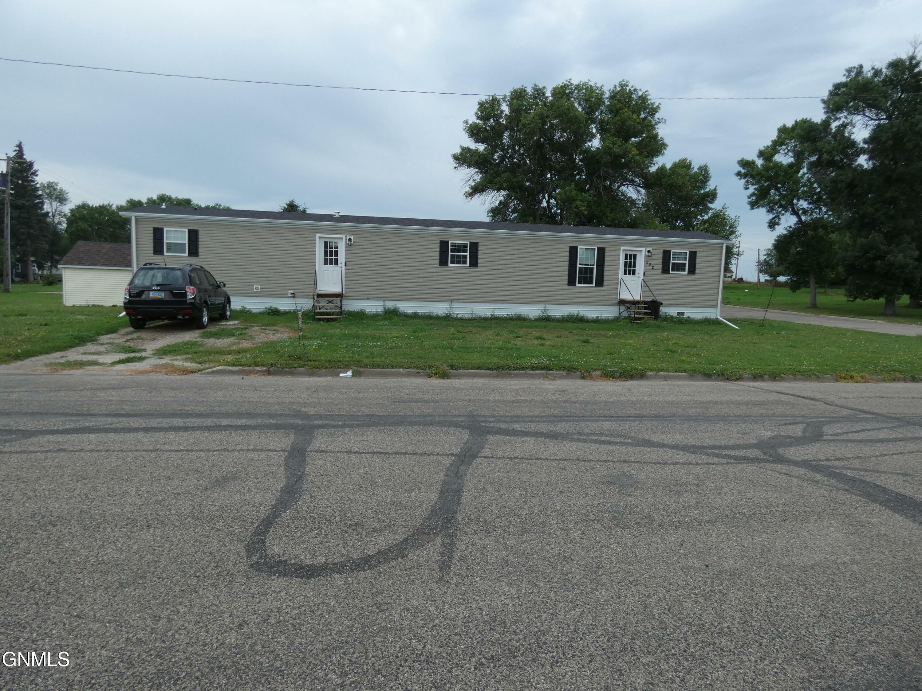 Property Photo:  322 5th Street W  ND 58561 