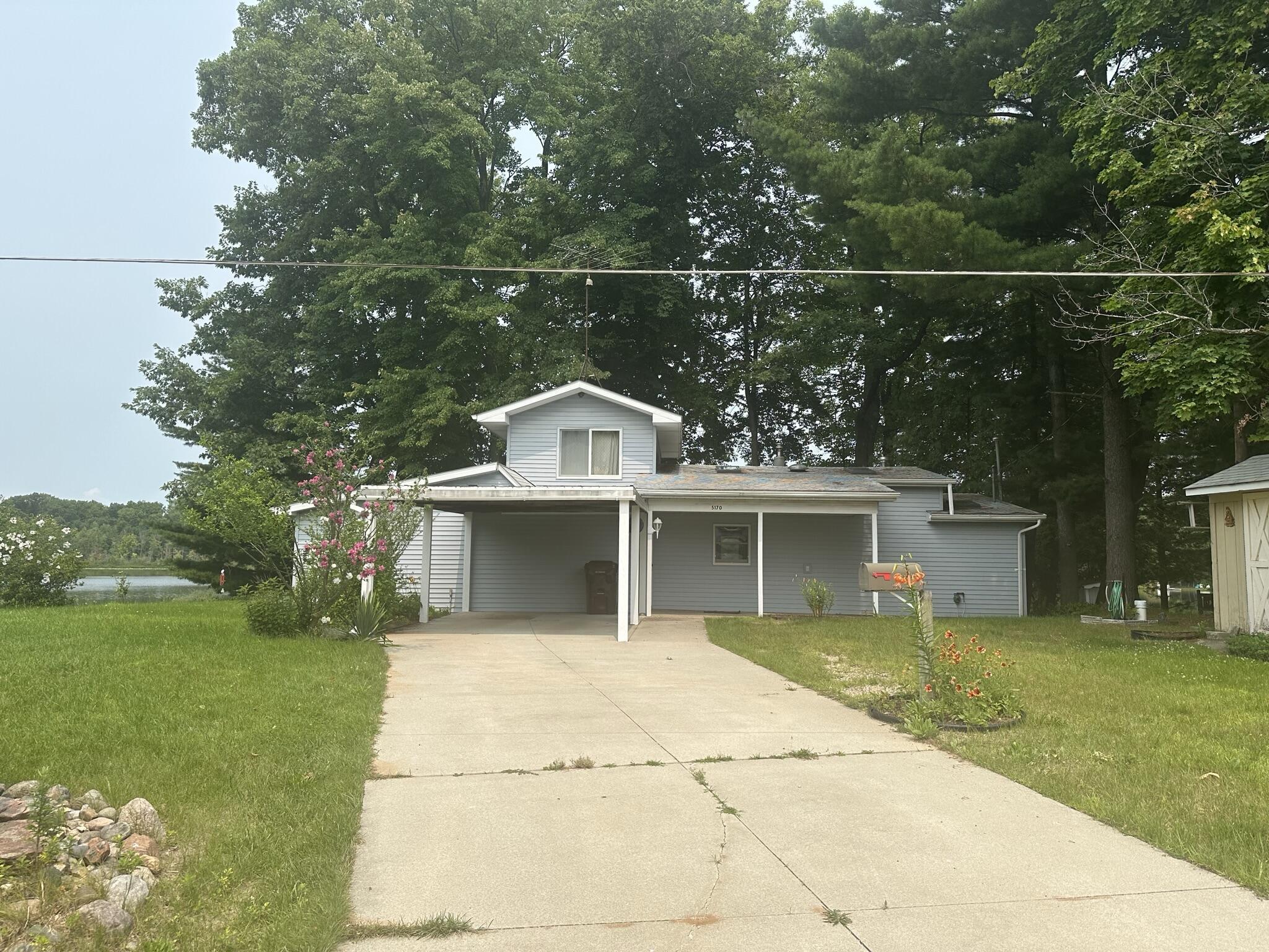 Property Photo:  5170 Birch Drive  MI 48850 