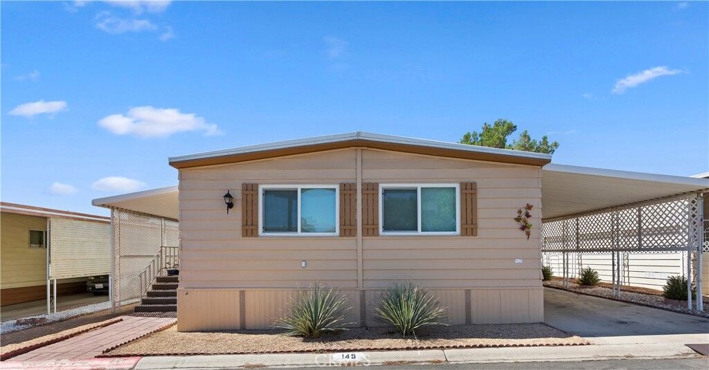 Property Photo: 13393 Mariposa Road 145 CA 92395