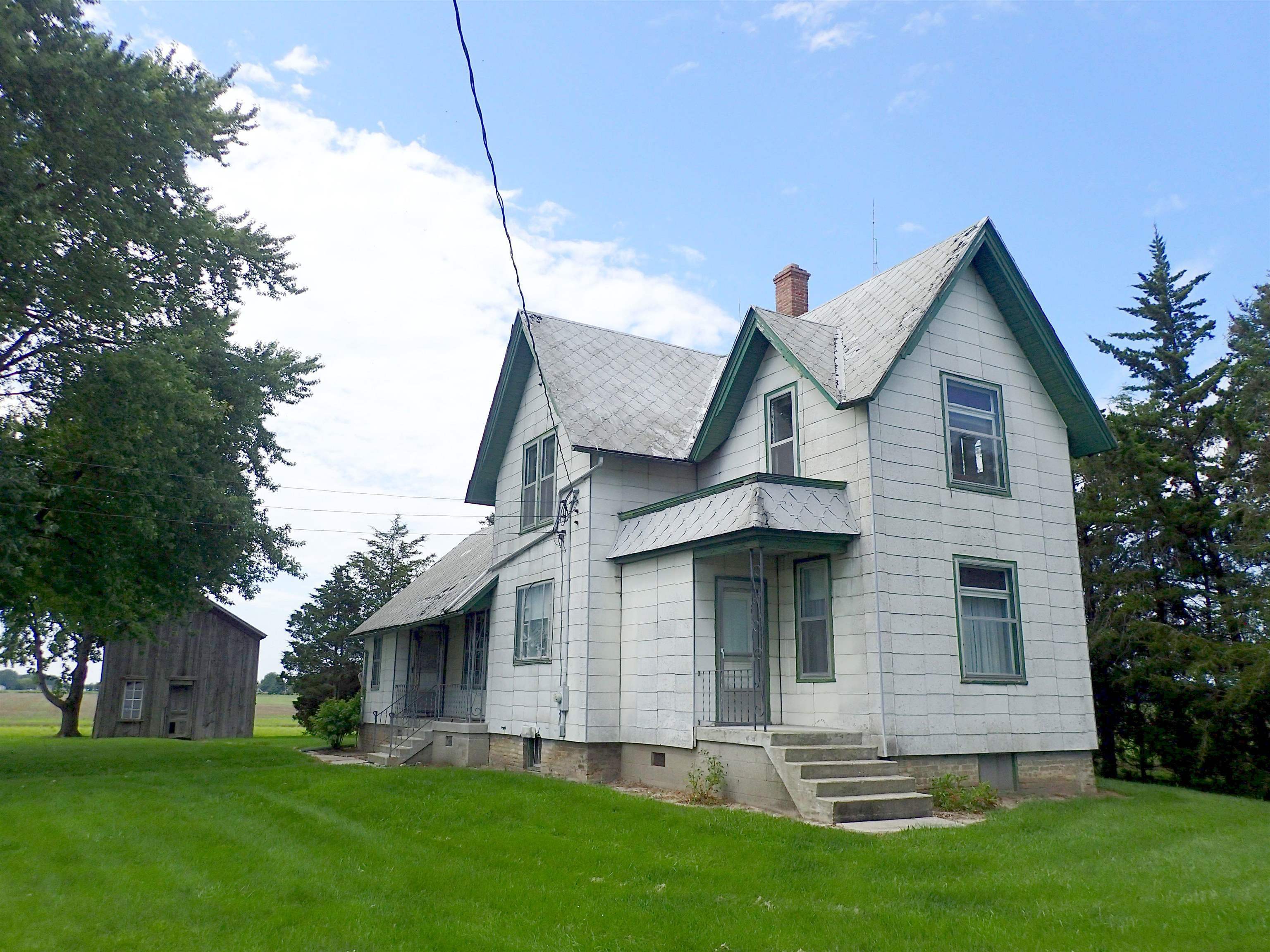 Property Photo:  7080 7 Mile  MI 48623 