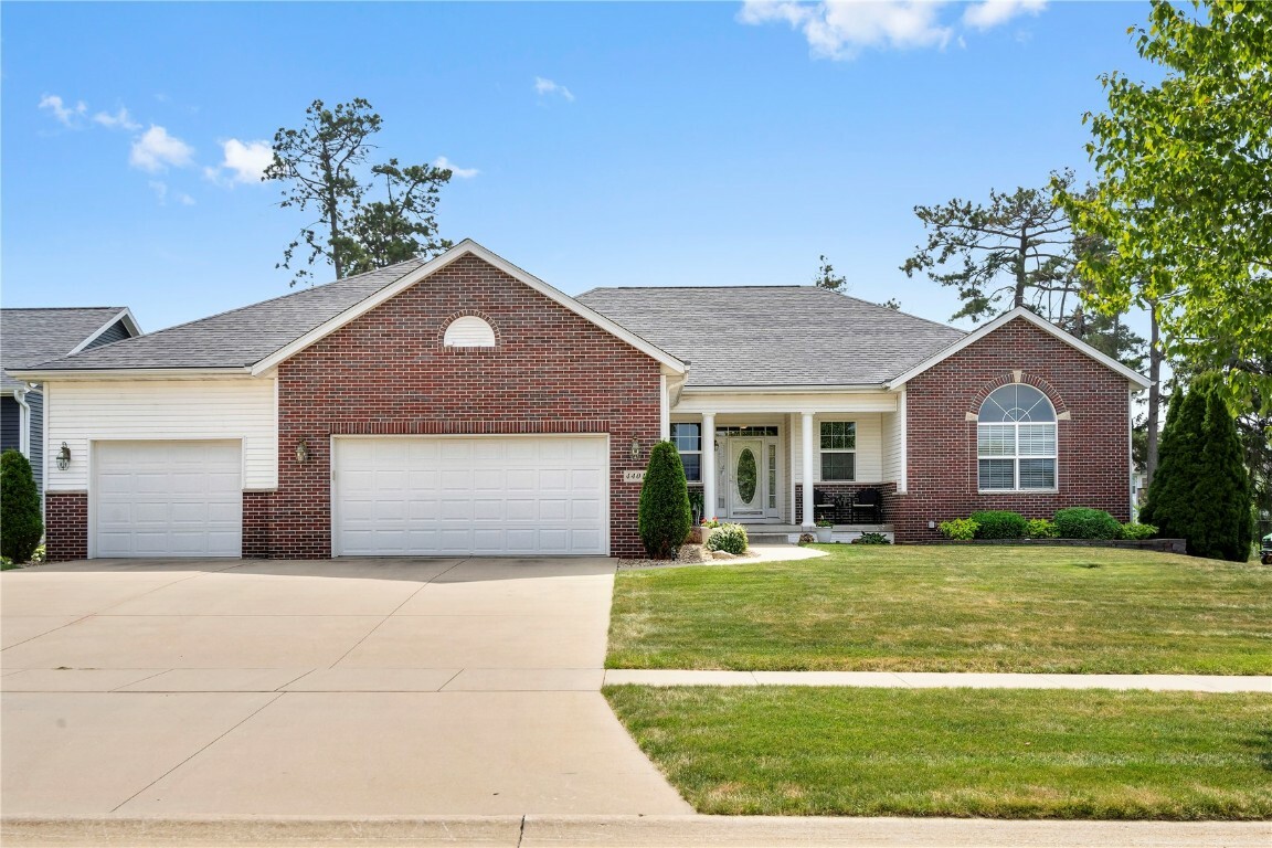 Property Photo:  4401 Woodsonia Court NW  IA 52405 