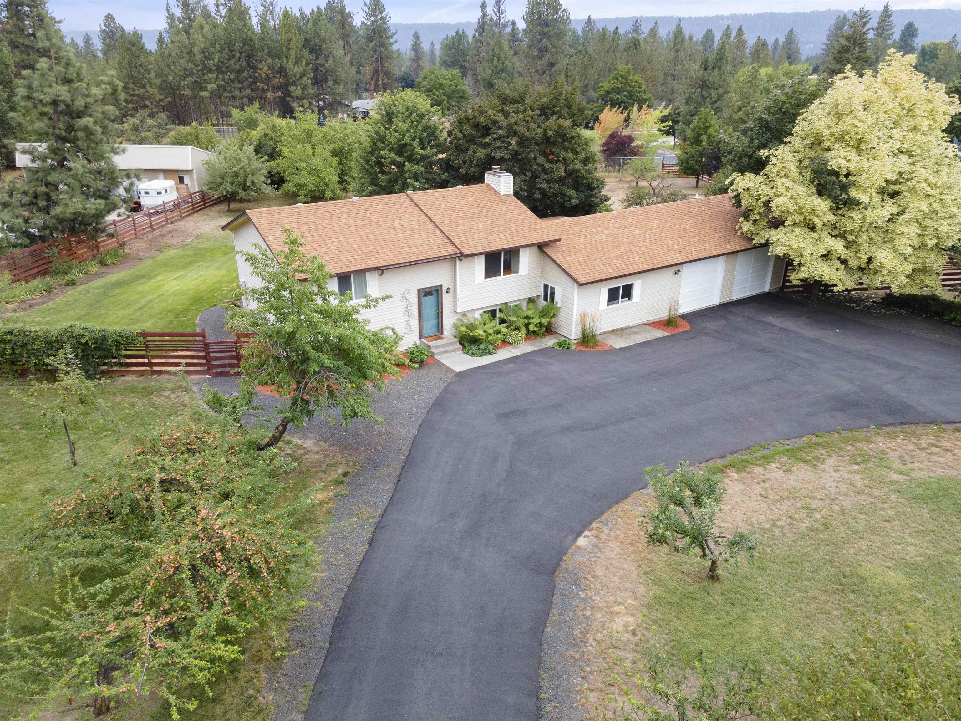 Property Photo: 10859 W Sagewood Rd WA 99026