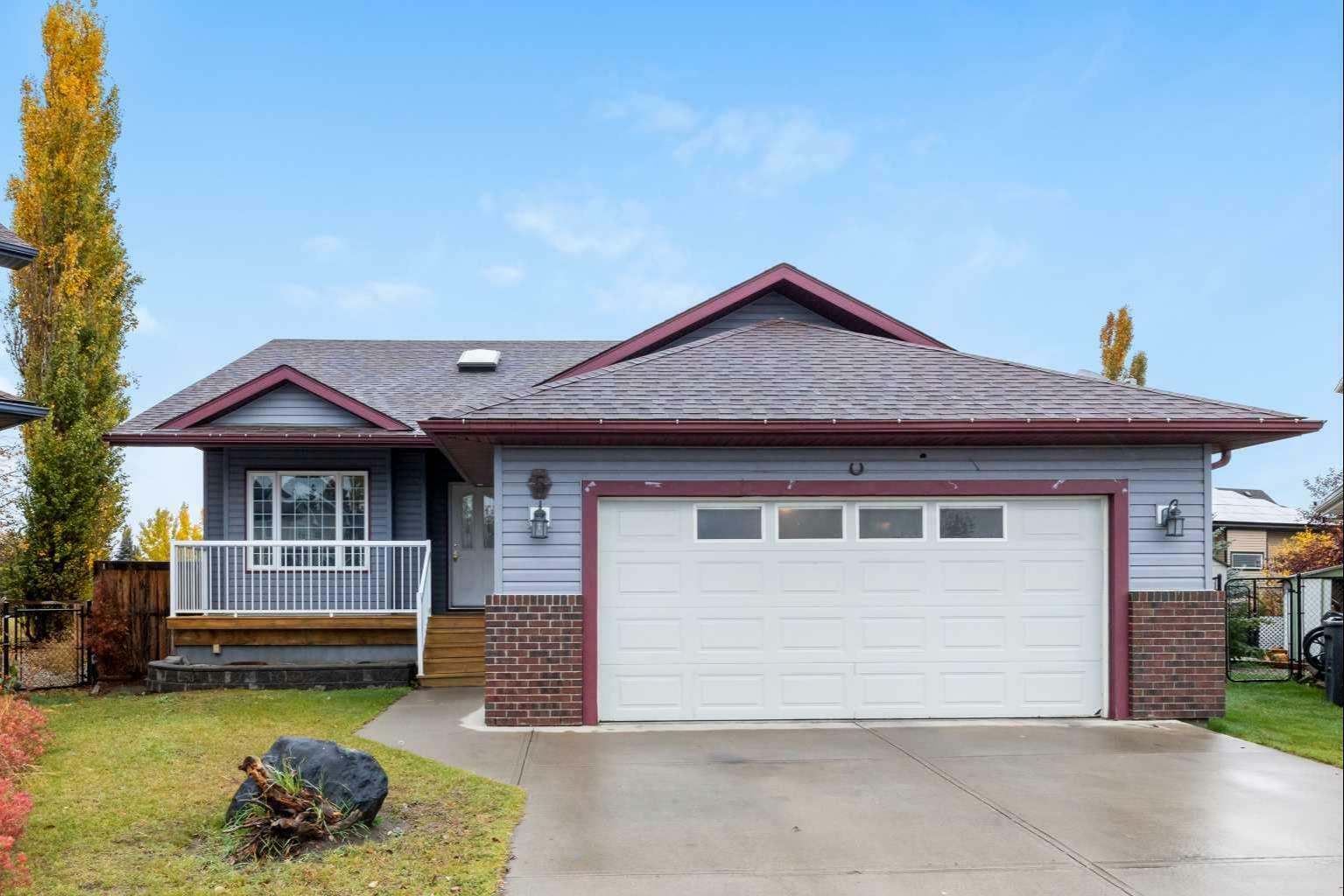 Property Photo: 5 Aspen Landing AB T1P 1R4