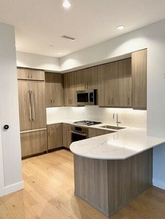 Property Photo:  10 Shipyard Drive 304  MA 02043 