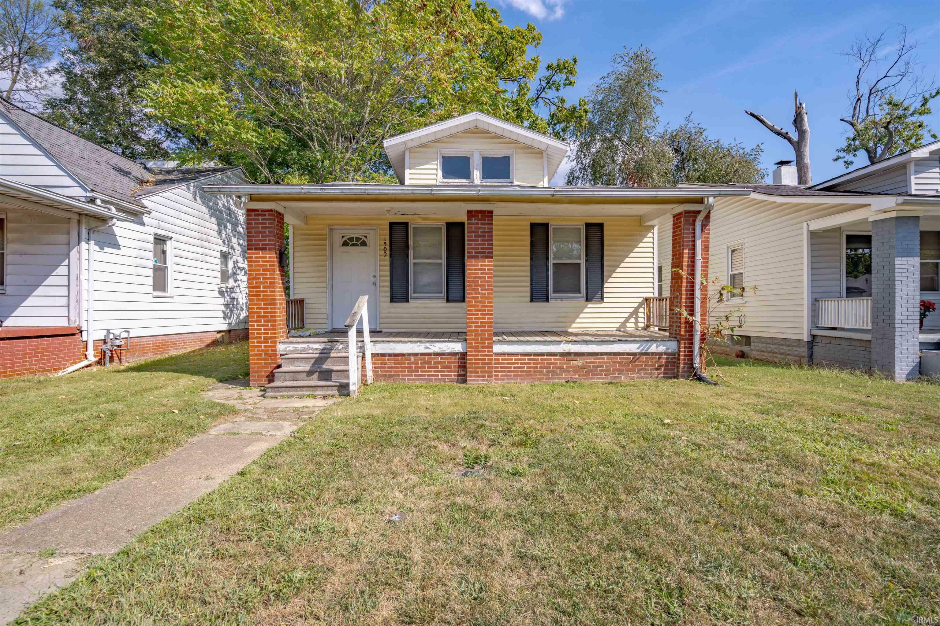 Property Photo:  1302 S Harlan Avenue  IN 47714 