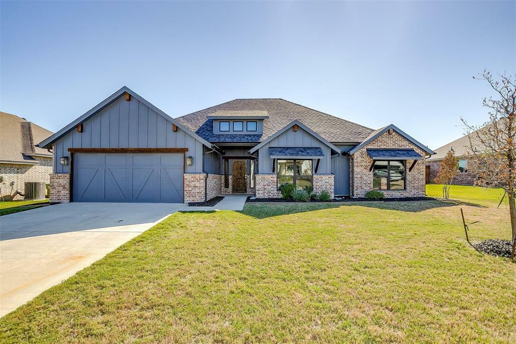 Property Photo:  203 Nolan River Run  TX 76044 