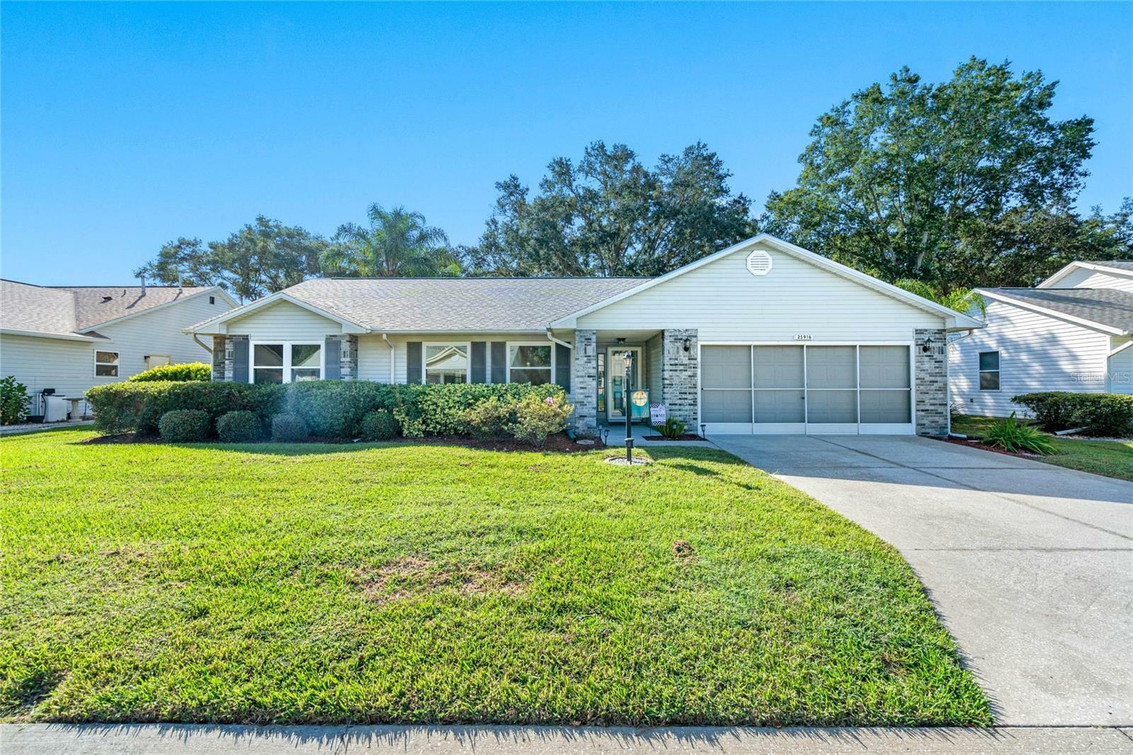 Property Photo:  25916 Newcombe Circle  FL 34748 