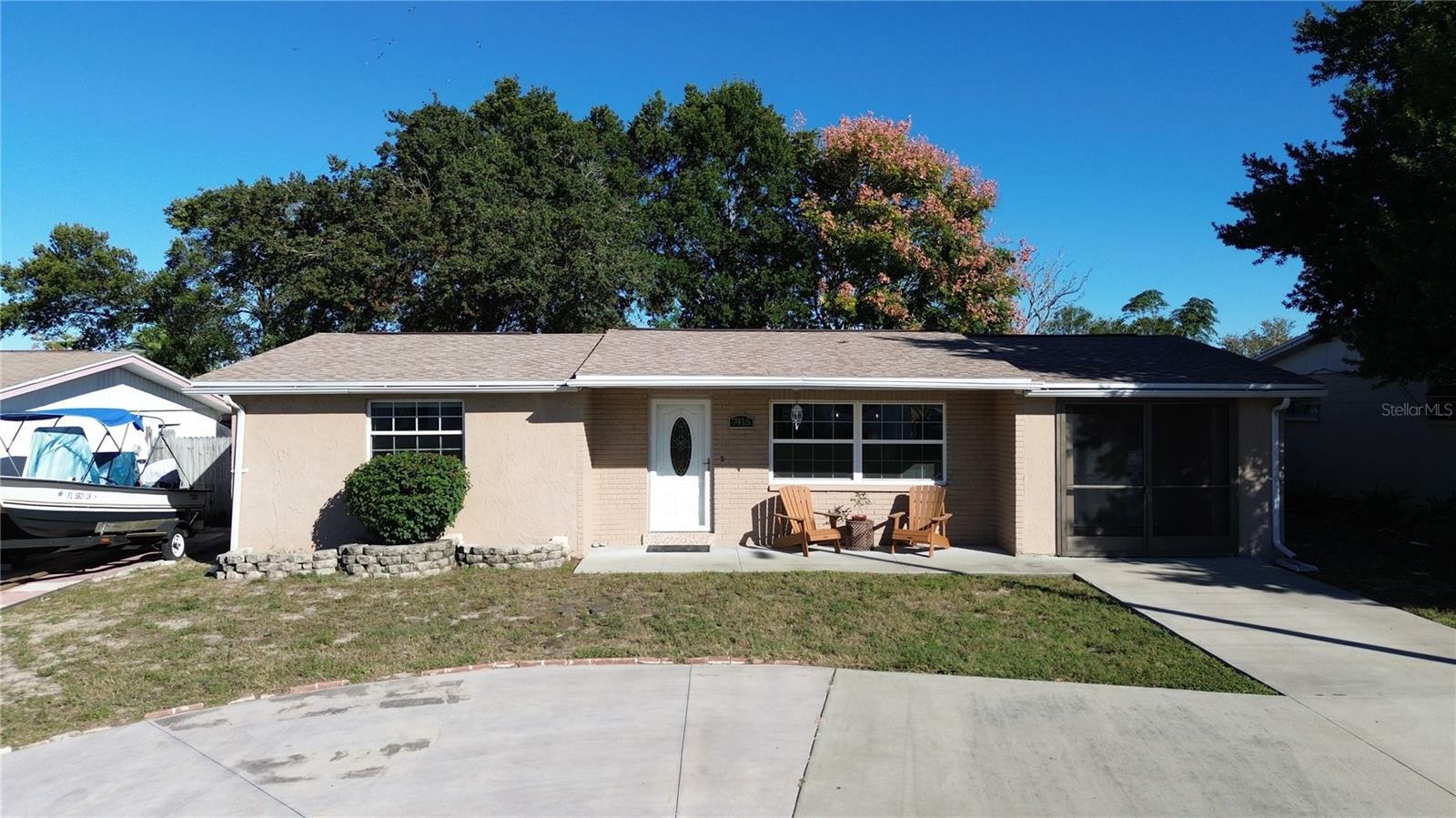 Property Photo: 7415 Neva Lane FL 34668