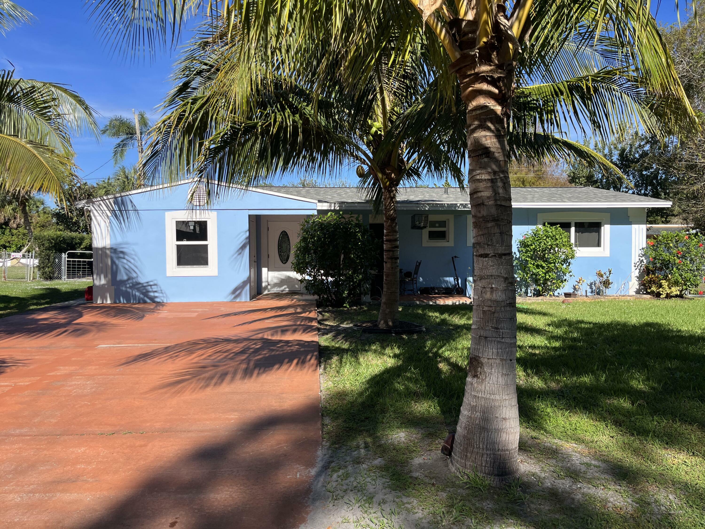 Property Photo:  505 SW All American Boulevard  FL 34990 