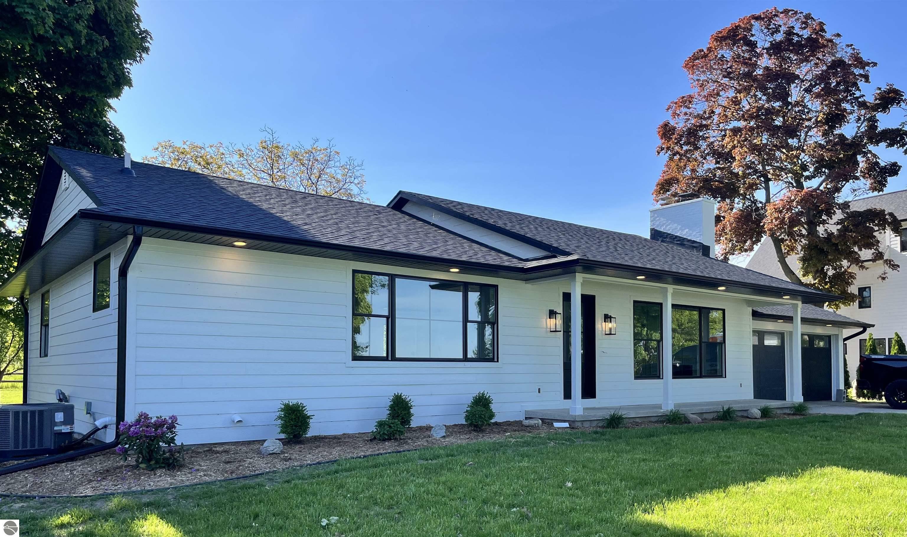 Property Photo:  13728 Peninsula Drive  MI 49686 