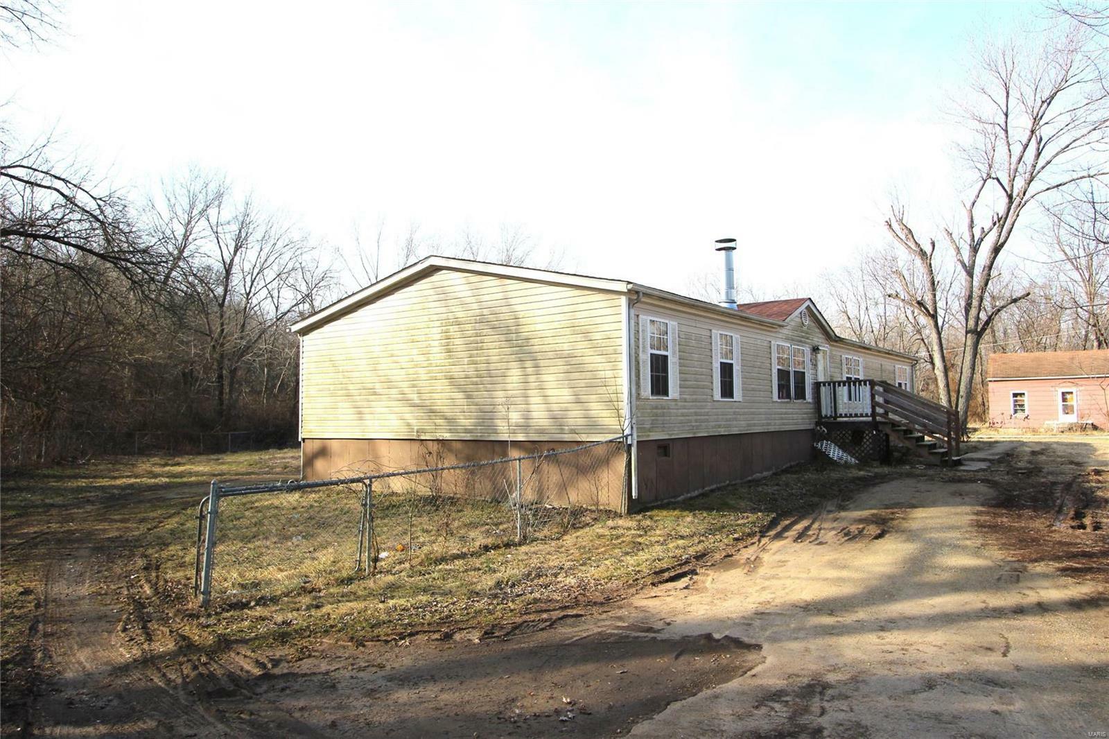 Property Photo:  412 Howell Street  MO 63601 