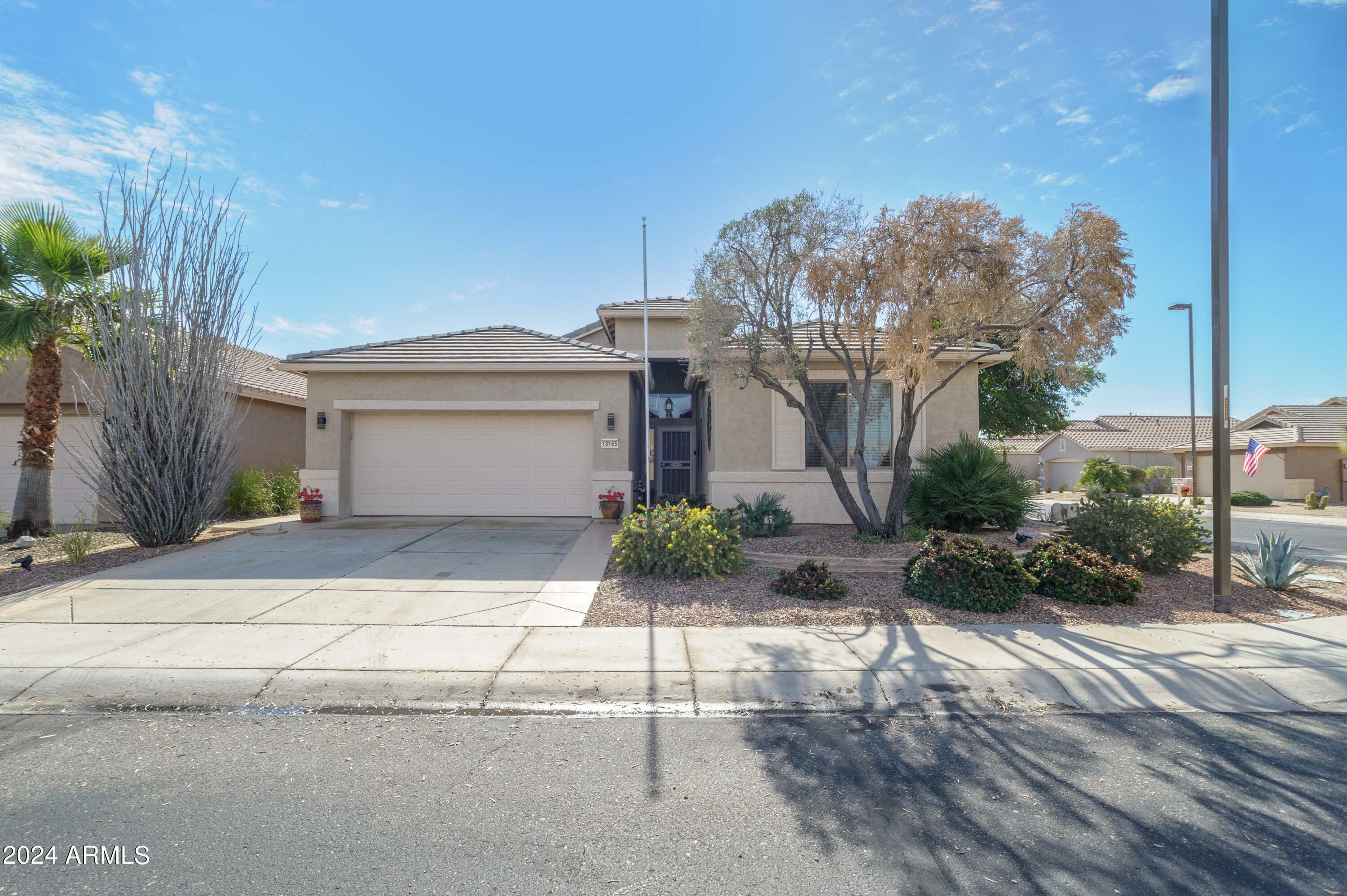 Property Photo: 18165 W Camino Real Drive AZ 85374