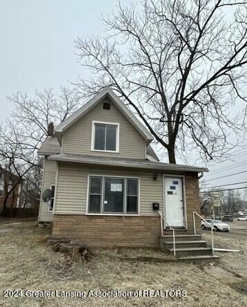 Property Photo:  1235 N Grand River Avenue  MI 48906 